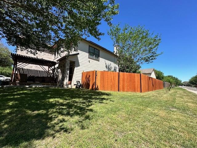 view of yard with a pergola