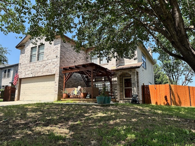 view of front facade featuring a garage, a front yard, and a pergola