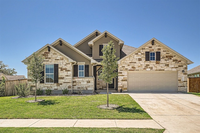 view of front facade featuring a front lawn and a garage