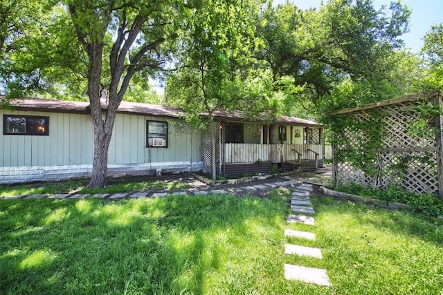 ranch-style house with a front yard