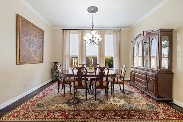 dining room featuring ornamental molding, dark hardwood / wood-style flooring, and an inviting chandelier