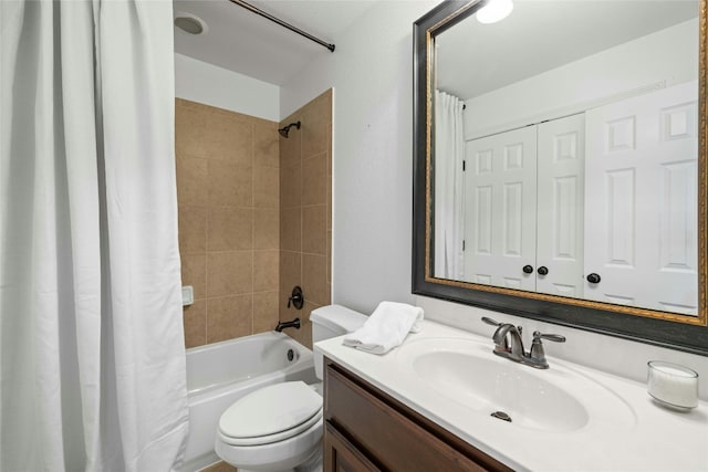 full bathroom featuring toilet, vanity, and shower / tub combo with curtain