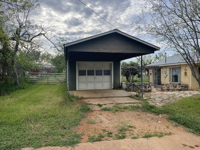 garage with a lawn