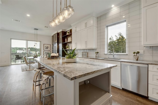 kitchen with decorative backsplash, dishwasher, a sink, and open shelves