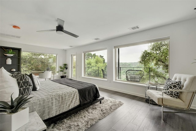 bedroom with wood-type flooring and ceiling fan