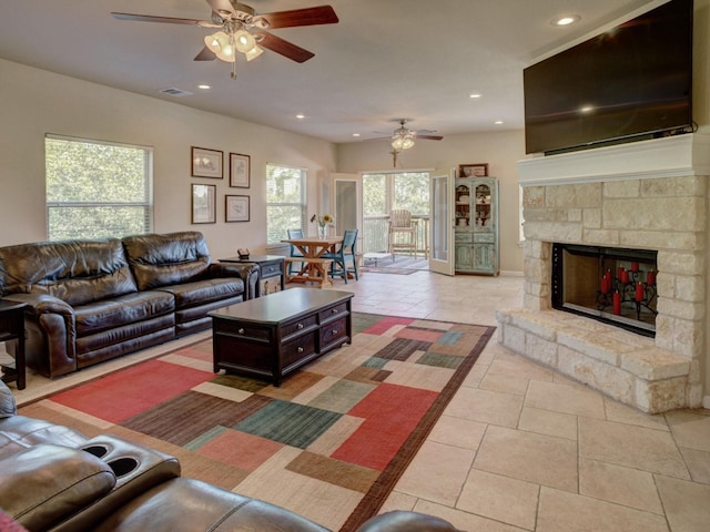 living room featuring recessed lighting, a fireplace, visible vents, and ceiling fan