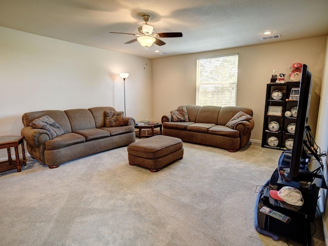 living room with baseboards, visible vents, recessed lighting, ceiling fan, and carpet flooring