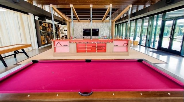 playroom with plenty of natural light and billiards