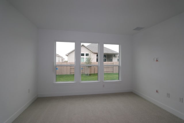 empty room featuring carpet flooring