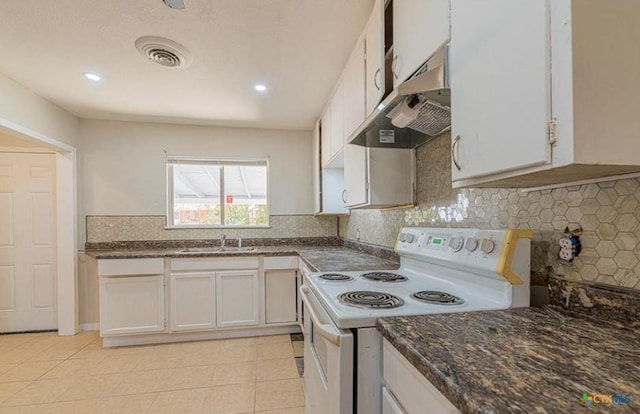 kitchen with white range with electric stovetop, white cabinets, backsplash, sink, and light tile patterned flooring