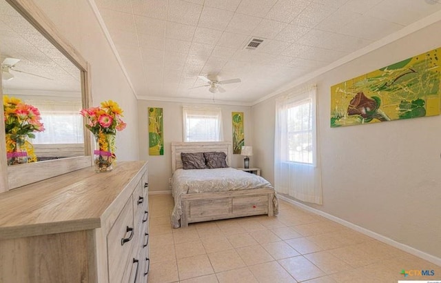 bedroom featuring crown molding, ceiling fan, and light tile patterned floors