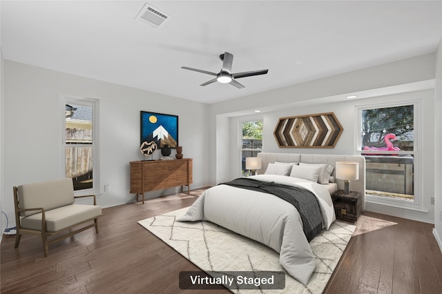 bedroom featuring ceiling fan and hardwood / wood-style floors