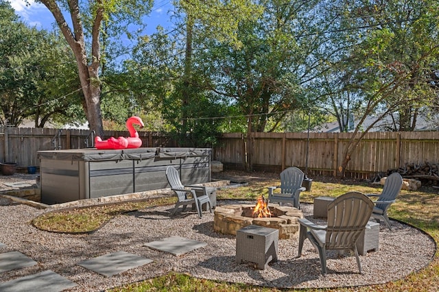 view of yard featuring an outdoor fire pit