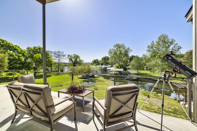 view of patio / terrace with a water view