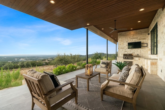 view of patio with ceiling fan, a grill, and outdoor lounge area