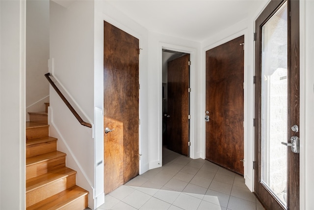 interior space with light tile patterned floors