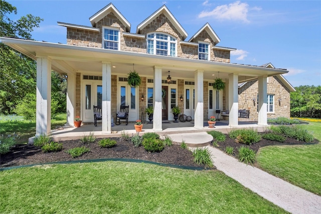 rear view of house with a porch