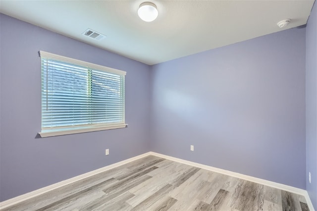 empty room with light wood-type flooring