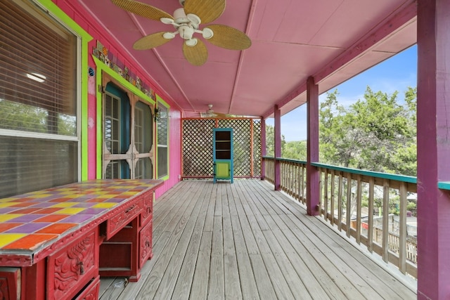 wooden deck with ceiling fan