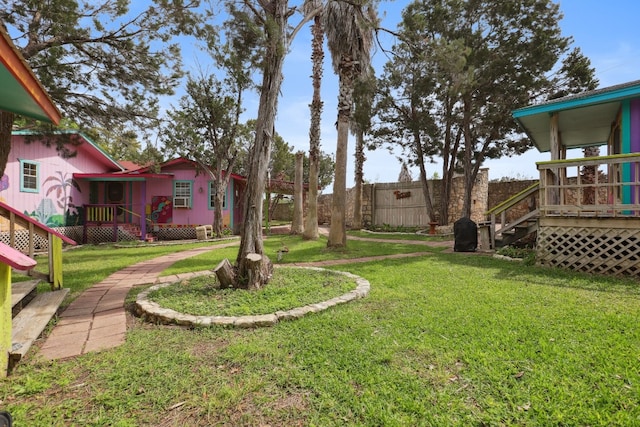 view of yard with a deck