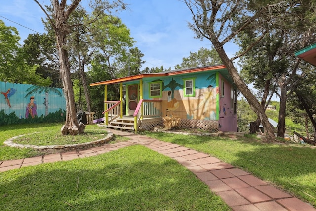 view of front of house with a front lawn