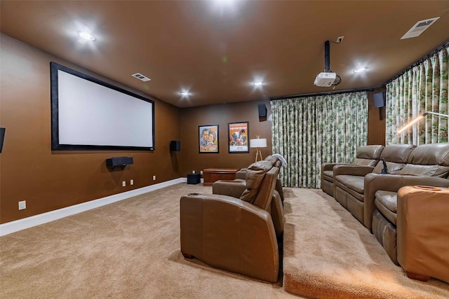 home theater featuring light carpet