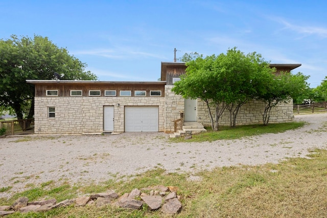 exterior space with a garage