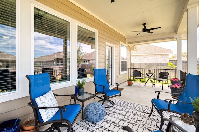 view of patio featuring ceiling fan