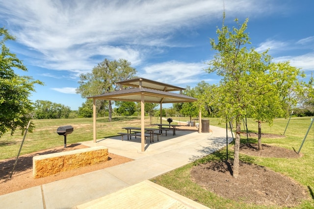 view of home's community with a yard and a gazebo