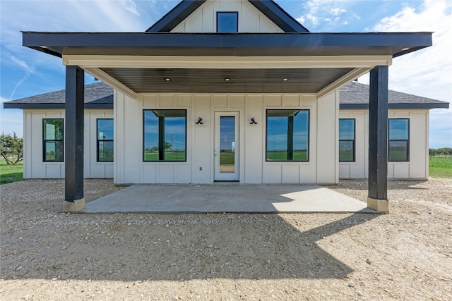 back of property with a patio area