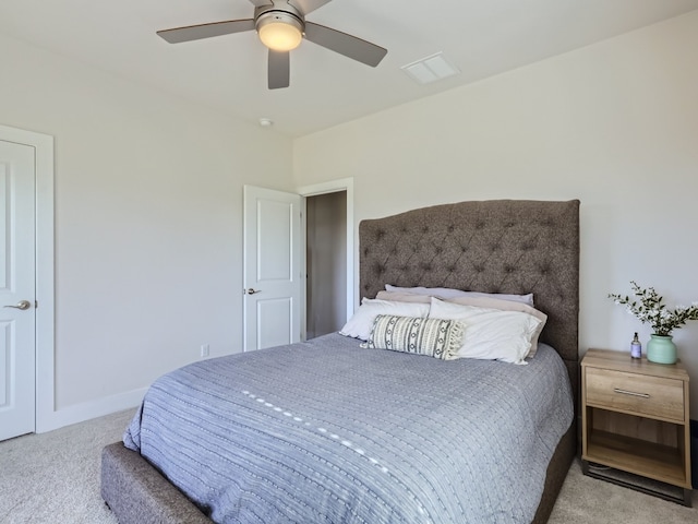 bedroom with light colored carpet and ceiling fan