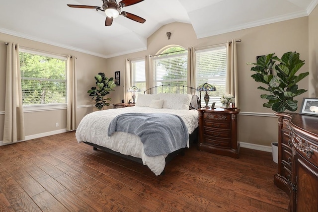 bedroom with ceiling fan, dark wood-type flooring, ornamental molding, and vaulted ceiling