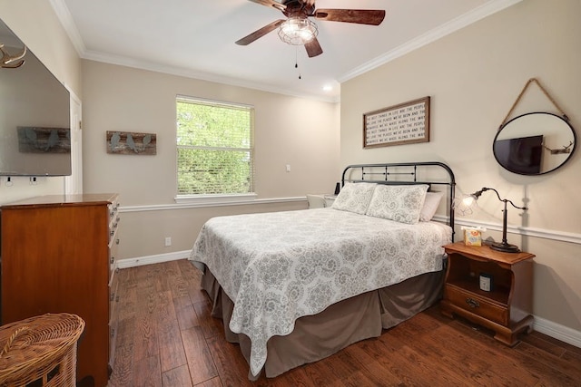 bedroom featuring ornamental molding, ceiling fan, and dark wood-type flooring