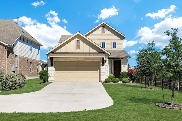 view of front of home featuring a front lawn and a garage