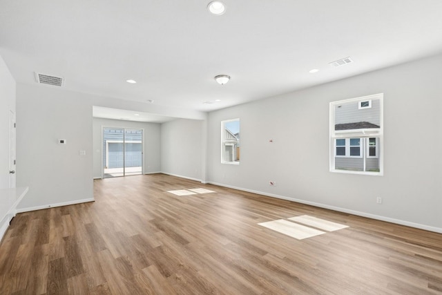 empty room with light wood-type flooring