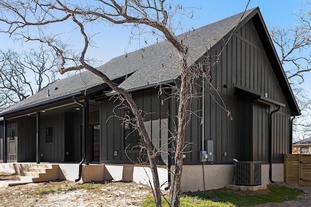 view of side of property featuring central air condition unit