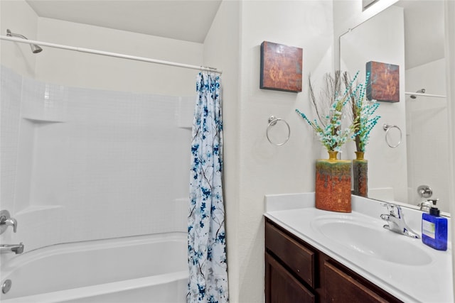 bathroom with shower / tub combo with curtain and vanity