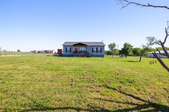 view of front of home with a front yard