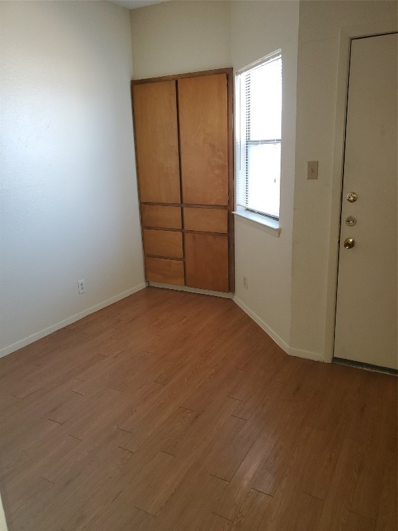 unfurnished bedroom featuring light hardwood / wood-style floors