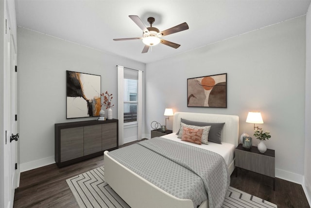 bedroom with dark hardwood / wood-style flooring and ceiling fan