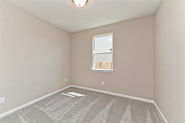 spare room with carpet flooring