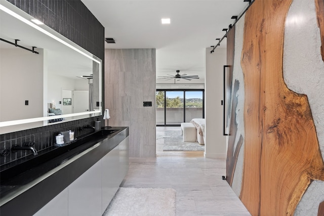 bathroom with vanity and ceiling fan