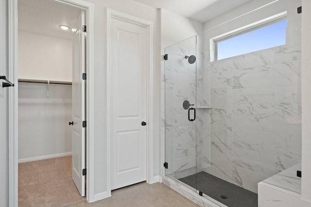 bathroom featuring walk in shower