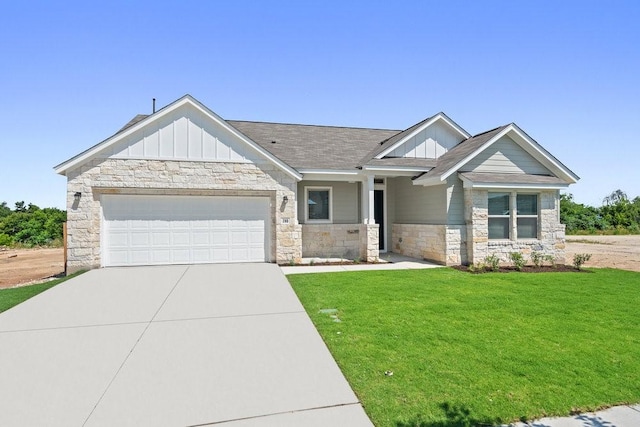 craftsman-style house with a front lawn and a garage