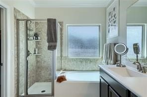 bathroom featuring crown molding, large vanity, and independent shower and bath