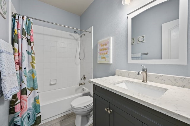 full bathroom with hardwood / wood-style flooring, shower / tub combo with curtain, vanity, and toilet