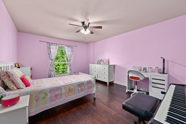 bedroom featuring ceiling fan and dark wood-type flooring