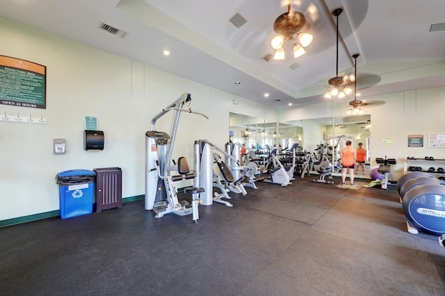 workout area featuring ceiling fan and lofted ceiling