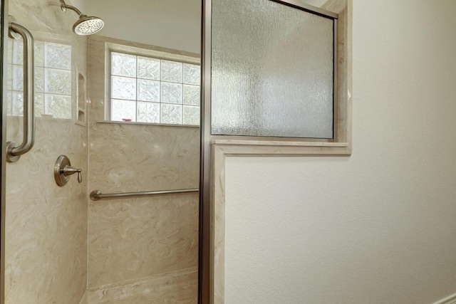 bathroom featuring walk in shower