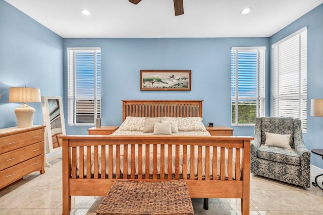 tiled bedroom with ceiling fan